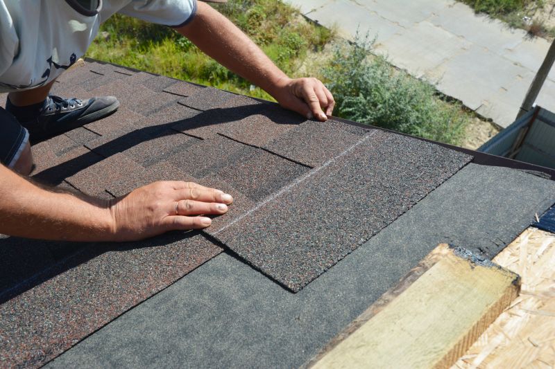 Asphalt Shingles Being Laid